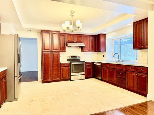Chandelier, Interior, Kitchen, Recessed Lighting, Stainless Steel Appliances, Wood Texture Flooring
