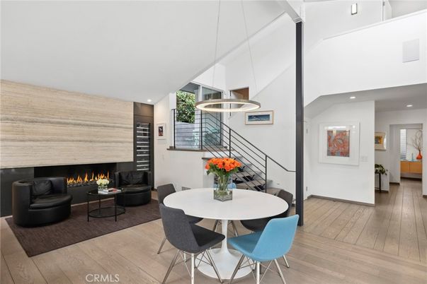 Dining room, Fireplace, Interior, Living room, Pendant Lights, Recessed Lighting, Wood Texture Flooring