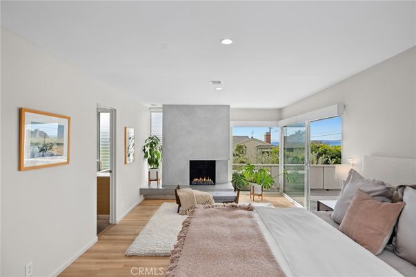 Bedroom, Fireplace, Interior, Recessed Lighting, Wood Texture Flooring