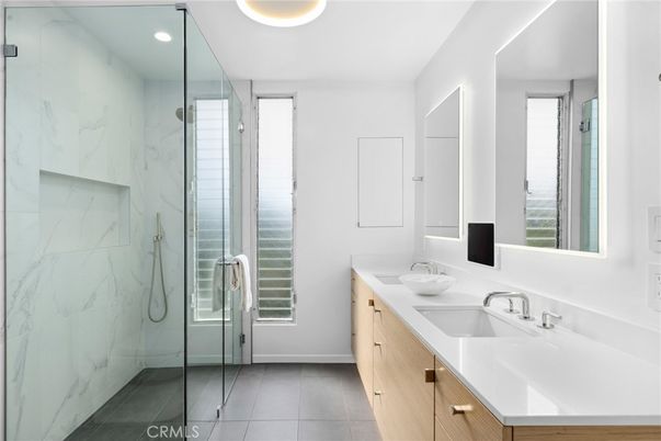 Bathroom, Dual Sink Vanities, Glass Shower, Interior, Marble Walls, Recessed Lighting