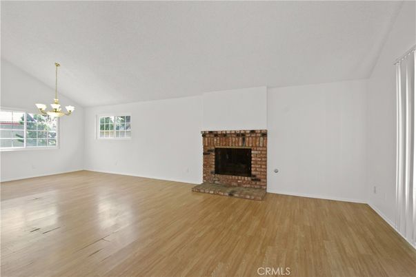 Chandelier, Empty room, Fireplace, Interior, Wood Texture Flooring