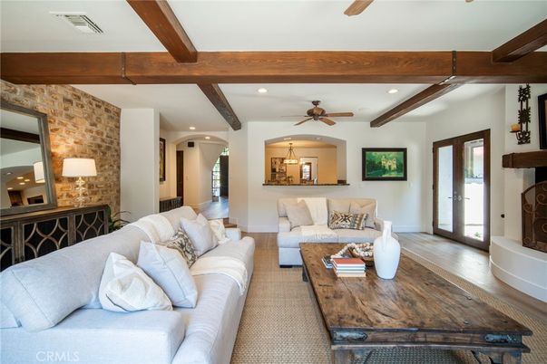 Fireplace, Interior, Living room, Recessed Lighting, Stone Walls, Wooden Beams, Wood Texture Flooring