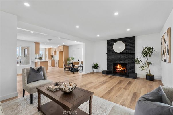 Dining room, Fireplace, Interior, Kitchen, Living room, Recessed Lighting, Wood Texture Flooring