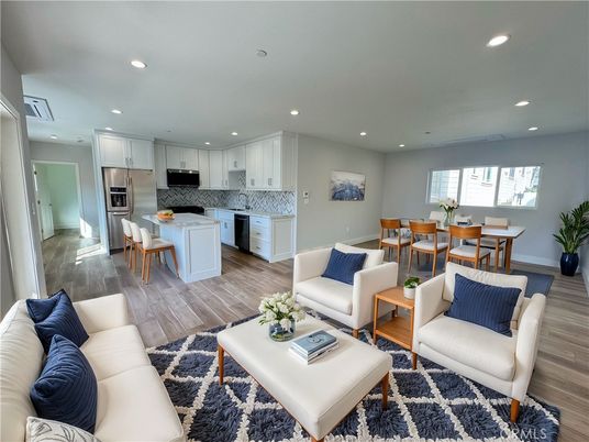 Dining room, Interior, Kitchen, Living room, Recessed Lighting, Stainless Steel Appliances, Wood Texture Flooring