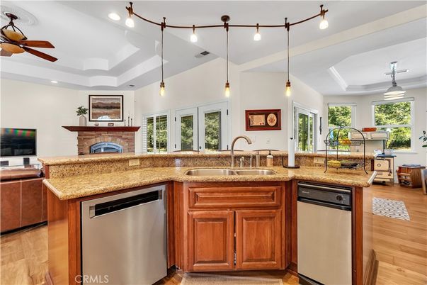 Fireplace, Interior, Kitchen, Pendant Lights, Recessed Lighting, Stainless Steel Appliances, Wood Texture Flooring