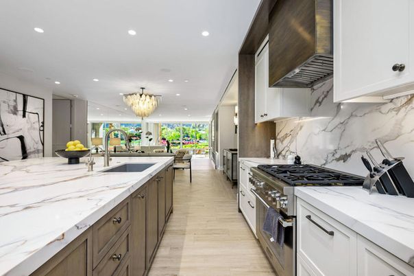 Chandelier, Interior, Kitchen, Marble Walls, Recessed Lighting, Stainless Steel Appliances, Wood Texture Flooring