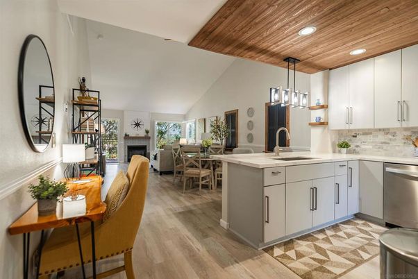 Dining room, Fireplace, Interior, Kitchen, Pendant Lights, Recessed Lighting, Stainless Steel Appliances, Wooden Ceilings, Wood Texture Flooring