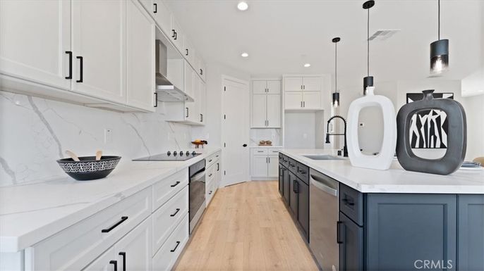 Interior, Kitchen, Marble Walls, Pendant Lights, Recessed Lighting, Wood Texture Flooring