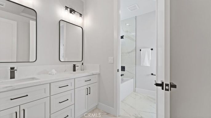 Bathroom, Dual Sink Vanities, Glass Shower, Interior, Marble, Marble Walls