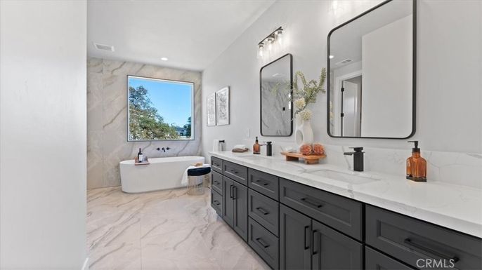 Bathroom, Dual Sink Vanities, Free Standing Baths, Interior, Marble, Marble Walls, Recessed Lighting