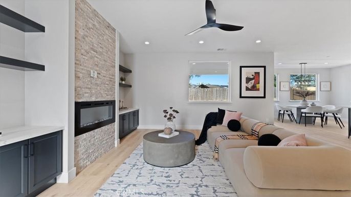 Dining room, Interior, Living room, Pendant Lights, Recessed Lighting, Stone Walls, Wood Texture Flooring