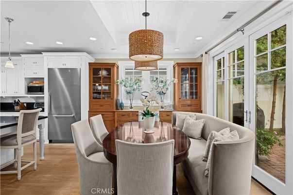 Dining room, Interior, Kitchen, Pendant Lights, Recessed Lighting, Stainless Steel Appliances, Wood Texture Flooring