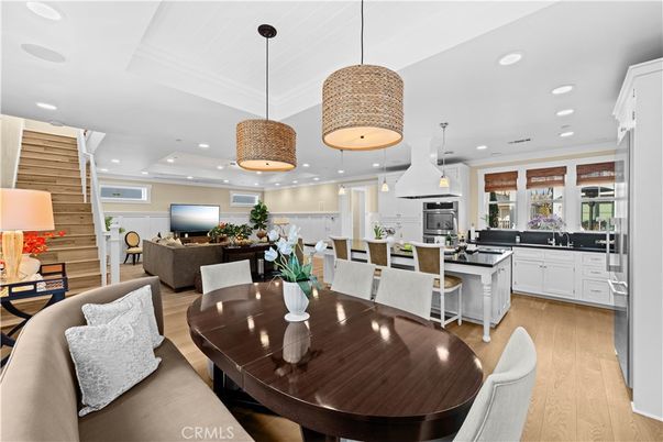 Dining room, Interior, Kitchen, Living room, Pendant Lights, Recessed Lighting, Stainless Steel Appliances, Wood Texture Flooring