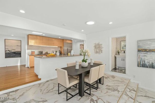 Dining room, Interior, Kitchen, Marble, Recessed Lighting, Stainless Steel Appliances, Wood Texture Flooring