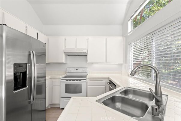 Interior, Kitchen, Stainless Steel Appliances, Tile Countertops