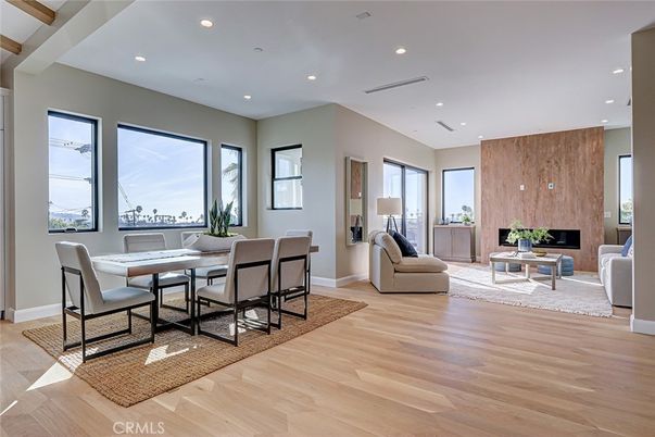 Dining room, Fireplace, Interior, Living room, Recessed Lighting, Wood Texture Flooring
