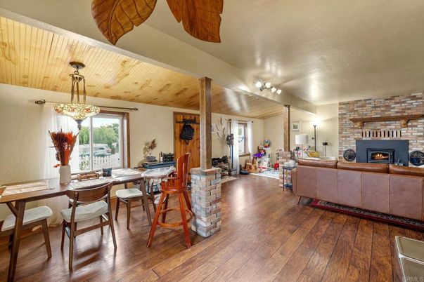 Dining room, Fireplace, Interior, Living room, Stone Walls, Wooden Ceilings, Wood Texture Flooring
