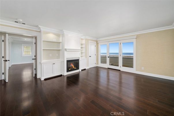 Empty room, Fireplace, Interior, Recessed Lighting, Water, Wood Texture Flooring