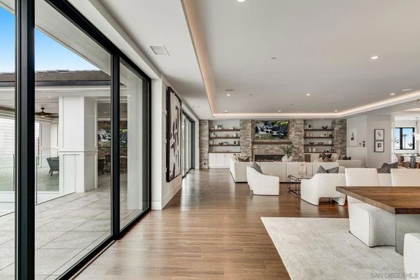 Fireplace, Interior, Living room, Recessed Lighting, Stone Walls, Wood Texture Flooring