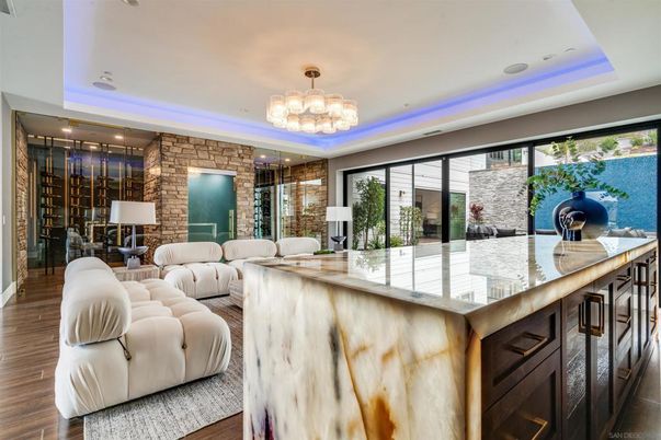 Chandelier, Interior, Living room, Recessed Lighting, Stone Walls, Wine Storage, Wood Texture Flooring