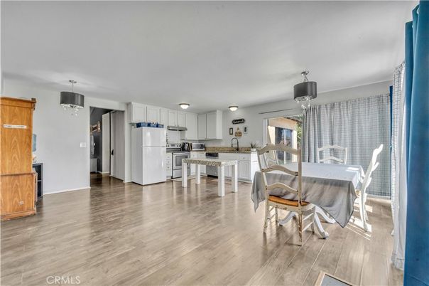 Dining room, Interior, Kitchen, Pendant Lights, Stainless Steel Appliances, Wood Texture Flooring