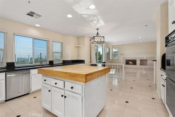 Fireplace, Interior, Kitchen, Pendant Lights, Recessed Lighting, Stainless Steel Appliances
