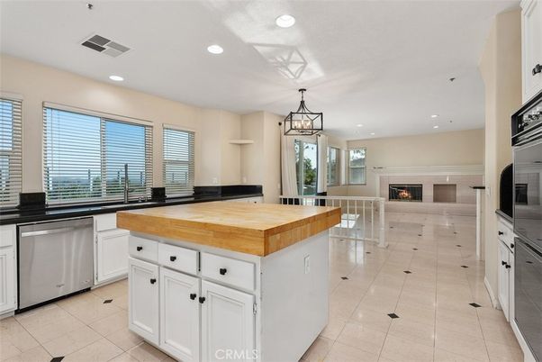 Fireplace, Interior, Kitchen, Pendant Lights, Recessed Lighting, Stainless Steel Appliances