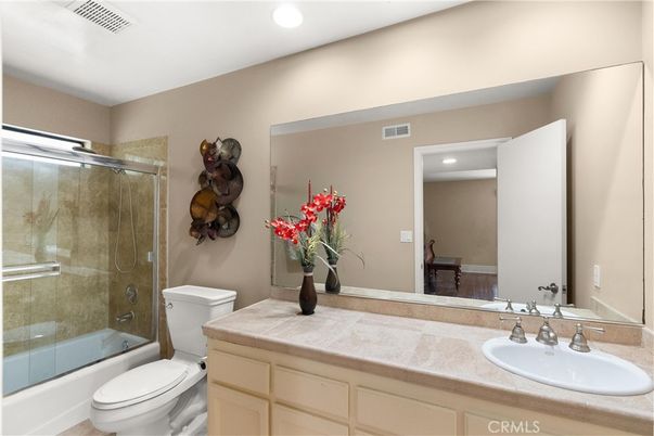 Bathroom, Dual Sink Vanities, Glass Shower, Interior, Recessed Lighting, Tile Countertops