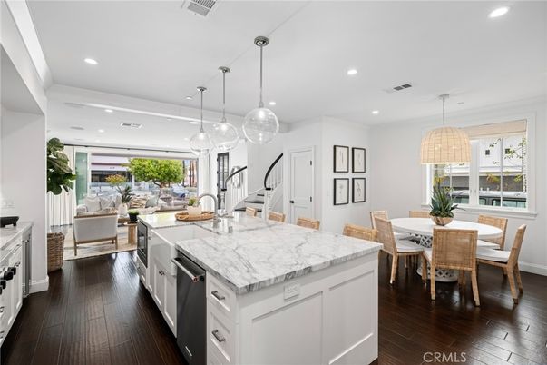Dining room, Interior, Kitchen, Living room, Pendant Lights, Recessed Lighting, Stainless Steel Appliances, Wood Texture Flooring