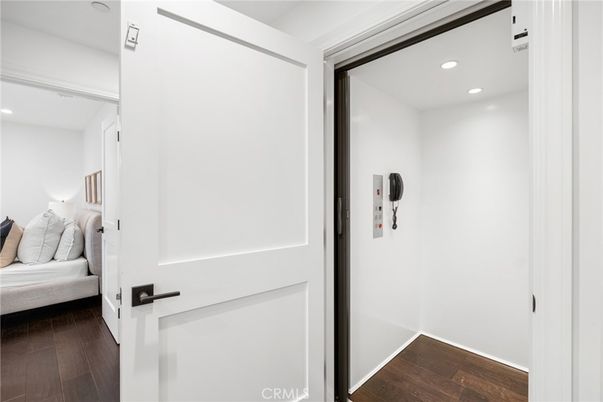 Elevator, Interior, Recessed Lighting, Wood Texture Flooring