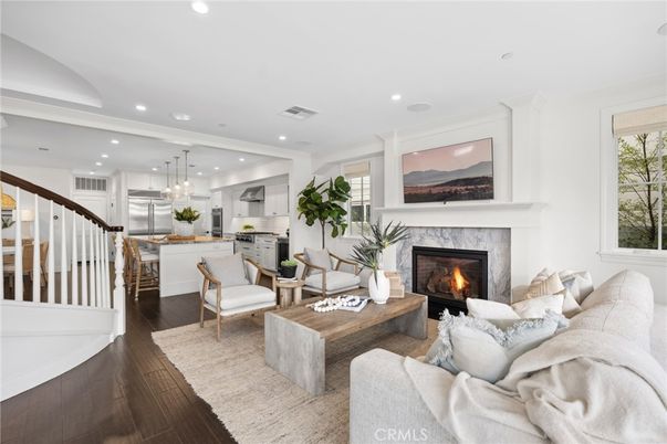 Fireplace, Interior, Kitchen, Living room, Pendant Lights, Recessed Lighting, Stainless Steel Appliances, Wood Texture Flooring