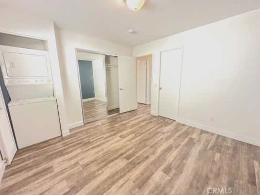 Empty room, Interior, Utility Closets, Washer, Wood Texture Flooring