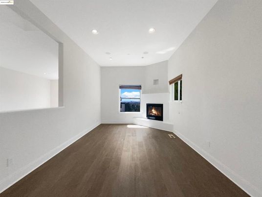 Empty room, Fireplace, Interior, Recessed Lighting, Wood Texture Flooring