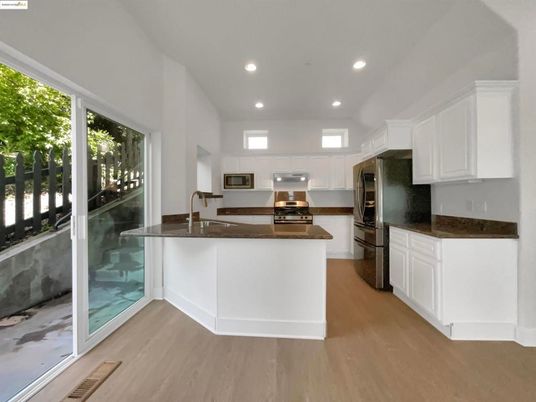 Interior, Kitchen, Recessed Lighting, Stainless Steel Appliances, Wood Texture Flooring