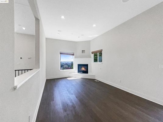 Empty room, Fireplace, Interior, Recessed Lighting, Wood Texture Flooring