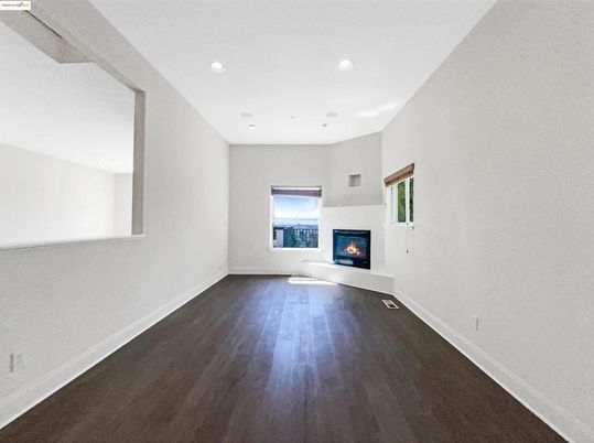 Empty room, Fireplace, Interior, Recessed Lighting, Wood Texture Flooring