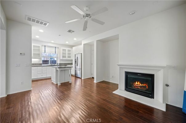 Empty room, Fireplace, Interior, Kitchen, Recessed Lighting, Wood Texture Flooring