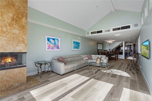 Chandelier, Dining room, Fireplace, Interior, Living room, Recessed Lighting, Wood Texture Flooring