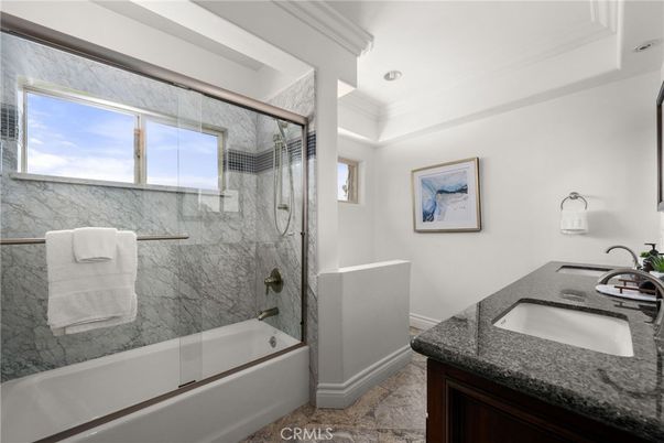 Bathroom, Dual Sink Vanities, Glass Shower, Interior, Marble Walls, Recessed Lighting