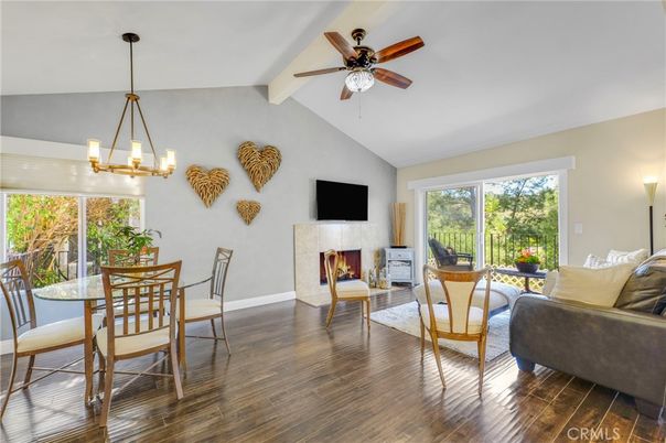 Chandelier, Dining room, Fireplace, Interior, Living room, Pendant Lights, Wood Texture Flooring