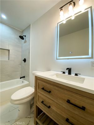 Bathroom, Dual Sink Vanities, Interior, Marble, Marble Walls, Recessed Lighting