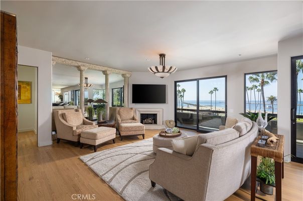 Fireplace, Interior, Living room, Recessed Lighting, Water, Wood Texture Flooring