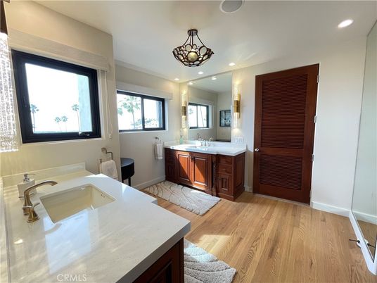 Bathroom, Dual Sink Vanities, Interior, Recessed Lighting, Wood Texture Flooring