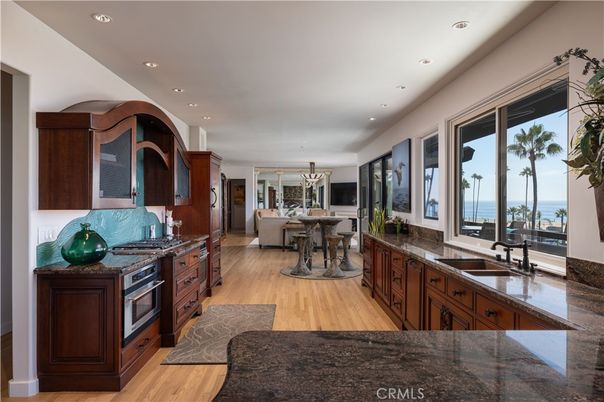 Dining room, Interior, Kitchen, Living room, Recessed Lighting, Water, Wood Texture Flooring