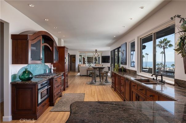 Dining room, Interior, Kitchen, Living room, Recessed Lighting, Water, Wood Texture Flooring
