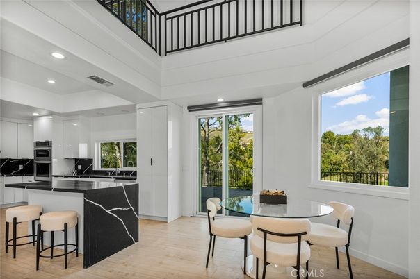 Dining room, Interior, Kitchen, Recessed Lighting, Stainless Steel Appliances, Wood Texture Flooring