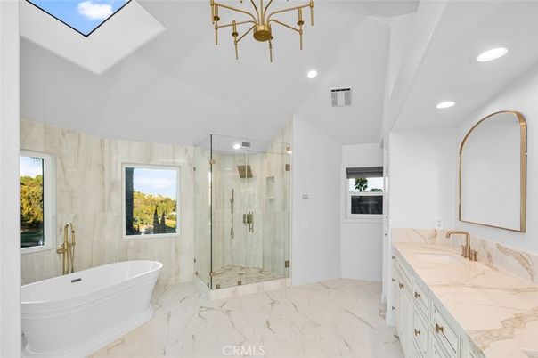 Bathroom, Dual Sink Vanities, Free Standing Baths, Glass Shower, Interior, Marble, Marble Walls, Recessed Lighting