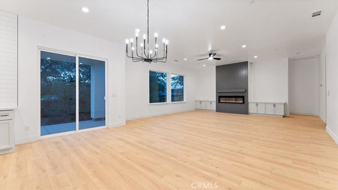 Empty room, Fireplace, Interior, Pendant Lights, Recessed Lighting, Wood Texture Flooring