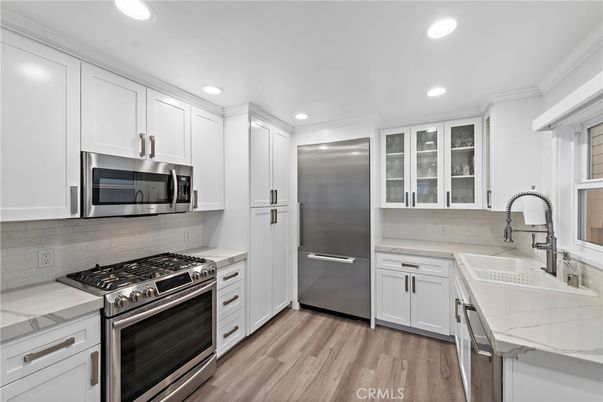 Interior, Kitchen, Recessed Lighting, Stainless Steel Appliances, Wood Texture Flooring