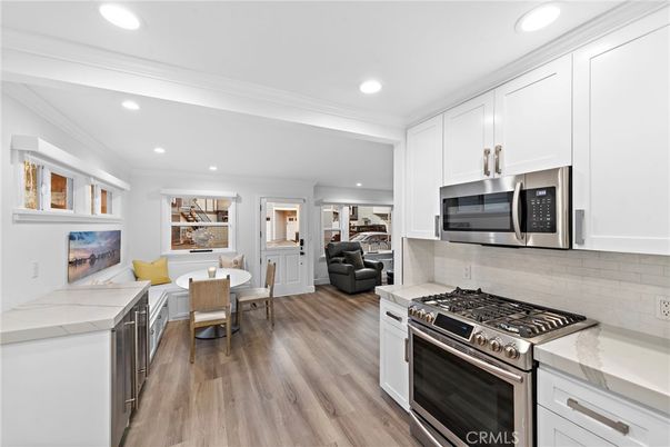 Dining room, Interior, Kitchen, Recessed Lighting, Stainless Steel Appliances, Wood Texture Flooring